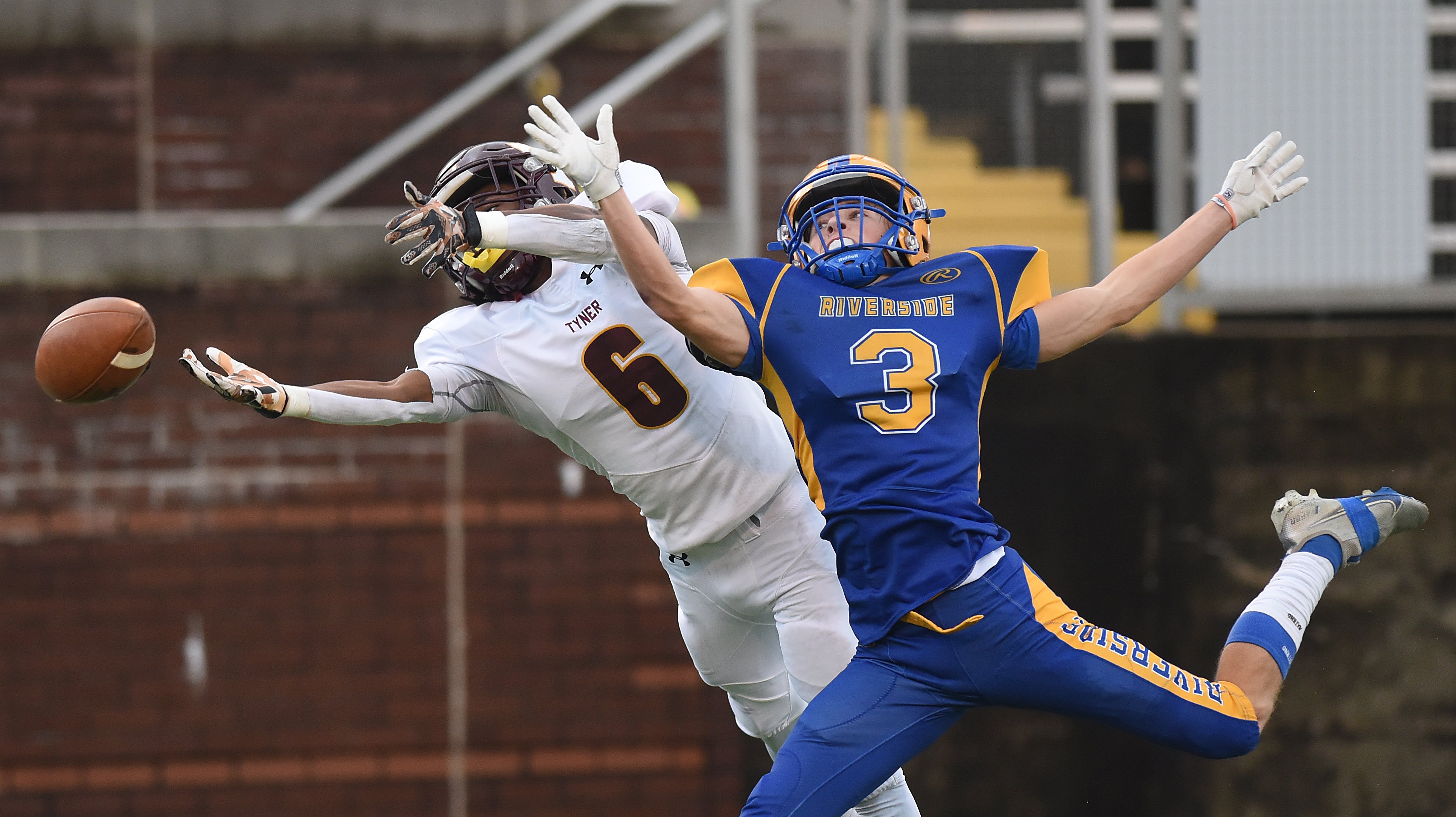 Staff Photo by Matt Hamilton / Tyner (6) Marcus Lewis can't hold on to a pass as Riverside (3) Keeton Evans knocks the ball away during the Class 2A BlueCross Bowl state championship game at Finley Stadium on Saturday, December 3, 2022.