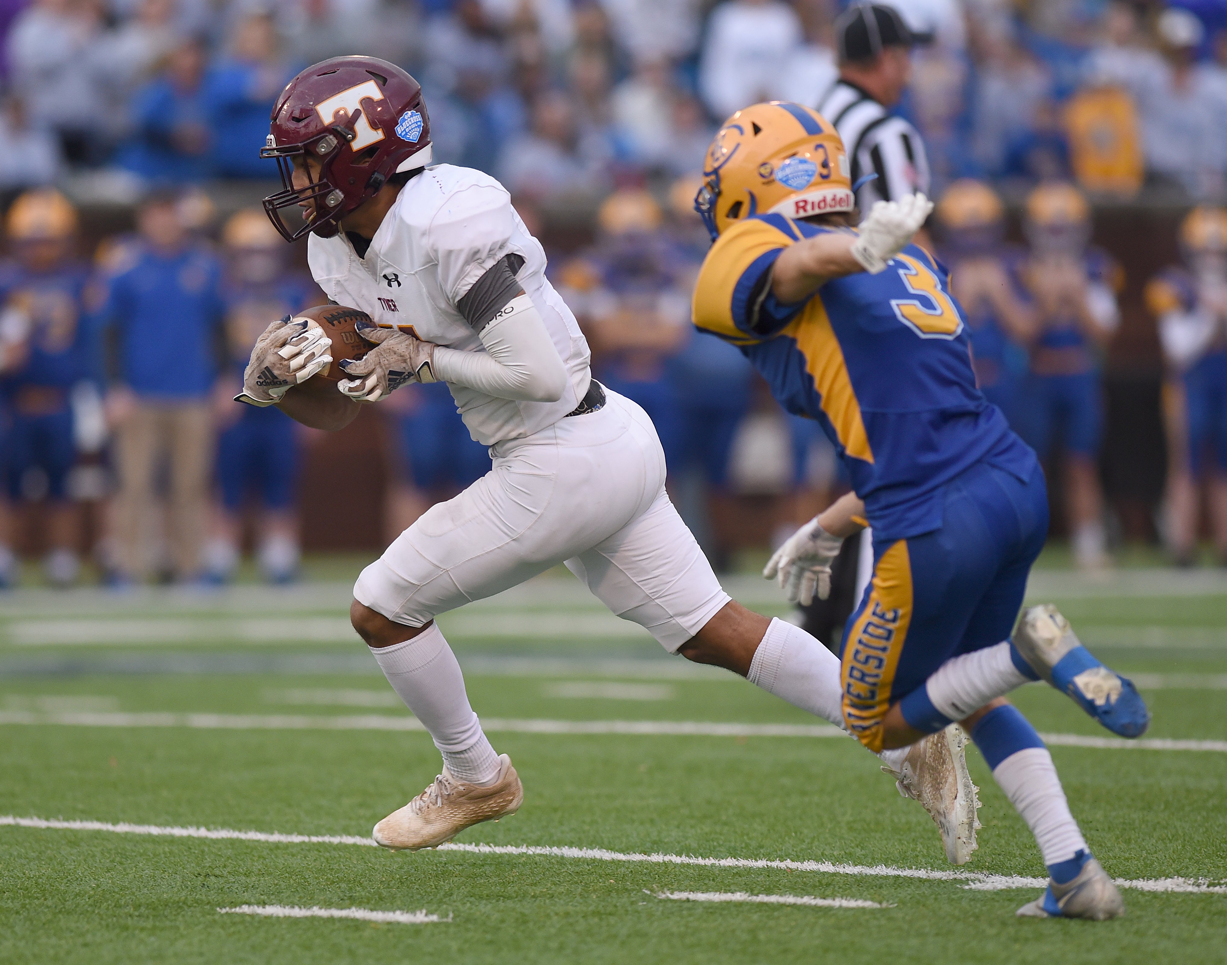 Staff Photo by Matt Hamilton / Tyner (11) Travis Ruffin catches a pass on the run and scores a touchdown during the Class 2A BlueCross Bowl state championship game at Finley Stadium on Saturday, December 3, 2022.