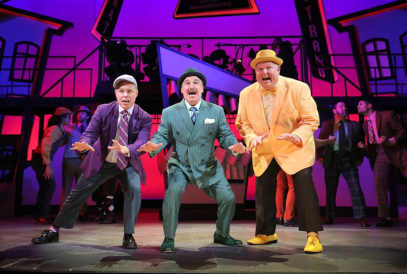 Ben Grimes (from left) as Benny Southstreet, Carlos Lopez as Nathan Detroit and P. Jay Clark as Nicely-Nicely Johnson seek a place to mount “the oldest established, permanent floating crap game in New York” in “Guys and Dolls” at the Arkansas Repertory Theatre. (Special to the Democrat-Gazette/Stephen B. Thornton)