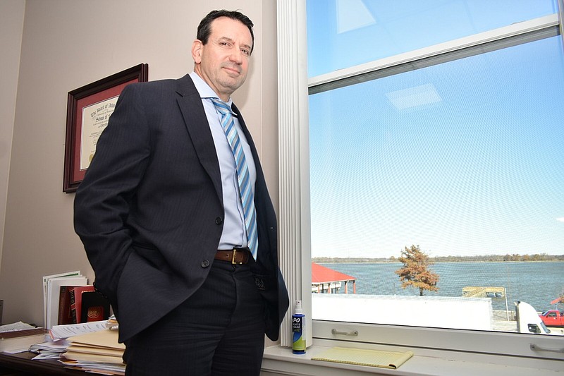 Jefferson County Chief Deputy Prosecuting Attorney Will Jones, pictured inside his office overlooking Lake Saracen, was elected Pulaski County Prosecuting Attorney in May. He will be sworn in Jan. 1. (Pine Bluff Commercial/I.C. Murrell)