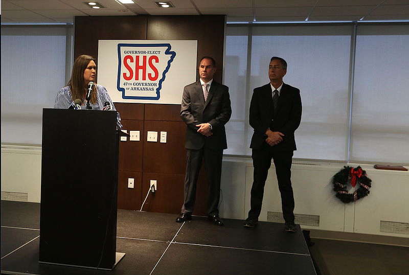 Governor-elect Sarah Huckabee Sanders announces Mike Hagar (center) and A.J. Gary (right) to cabinet positions during a press conference on Monday, Dec. 5, 2022, in Little Rock. (Arkansas Democrat-Gazette/Tommy Metthe)
