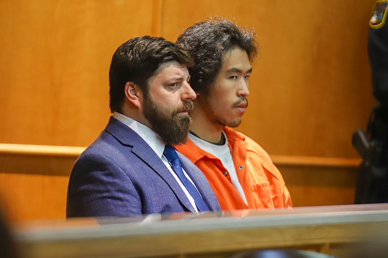 Staff photo by Olivia Ross  / Jason Chen sits in the courtroom with his attorney Josh Weiss on Tuesday.