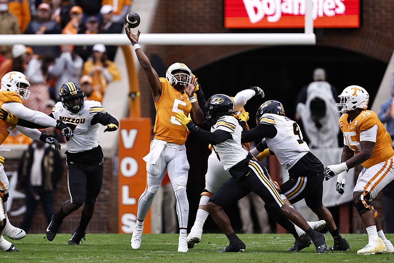 Tennessee quarterback Hendon Hooker (5) throws a pass during the first half of an NCAA college football game against Missouri Saturday, Nov. 12, 2022, in Knoxville, Tenn. (AP Photo/Wade Payne)