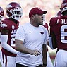 Arkansas defensive coordinator Barry Odom talks to players prior to a game against Missouri State on Saturday, Sept. 17, 2022, in Fayetteville.
