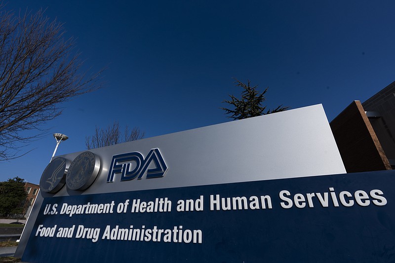 FILE - A sign in front of the Food and Drug Administration building is seen on Dec. 10, 2020, in Silver Spring, Md. (AP Photo/Manuel Balce Ceneta, File)