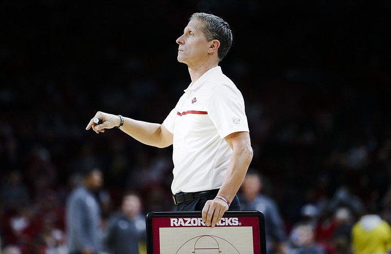 Arkansas head coach Eric Musselman gestures, Monday, November 28, 2022 during the second half of a basketball game at Bud Walton Arena in Fayetteville. Visit nwaonline.com/221129Daily/ for today's photo gallery...(NWA Democrat-Gazette/Charlie Kaijo)