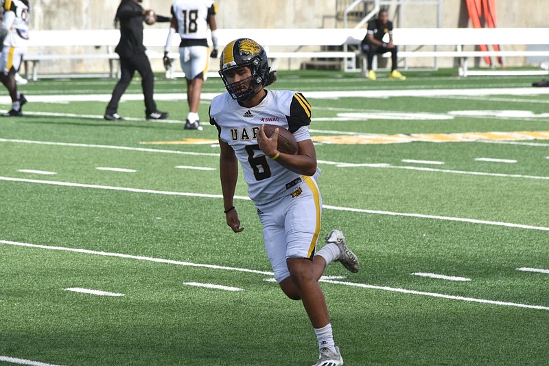 UAPB quarterback Chancellor Edwards runs a drill before a Nov. 24 win at Alabama State University in Montgomery. (Pine Bluff Commercial/I.C. Murrell)