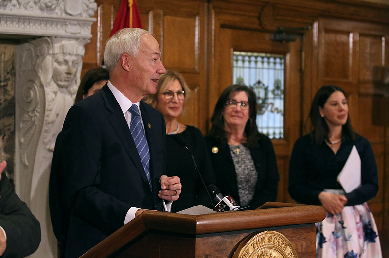 Gov. Asa Hutchinson speaks on Dec. 7, 2022, at the state Capitol during a press conference held to announce the  release of the Arkansas Women’s Commission's statewide report analyzing the economic status of women in the workforce. (Arkansas Democrat-Gazette/Thomas Metthe)