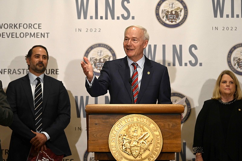 Governor Asa Hutchinson addresses the media during a press conference discussing a report by the Arkansas Council on Future Mobility on Thursday, Dec. 8, 2022. (Arkansas Democrat-Gazette/Stephen Swofford)