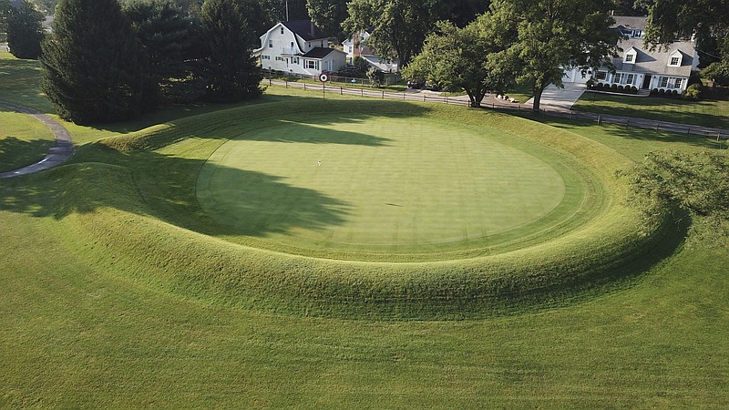 FILE - A 155-foot diameter circular enclosure around hole number 3 at Moundbuilders Country Club at the Octagon Earthworks in Newark, Ohio, is pictured July 30, 2019. (Doral Chenoweth III/The Columbus Dispatch via AP, File)