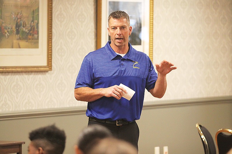 Fatima boys basketball coach Ryan Robertson speaks to the crowd during Wednesday’s press conference for the Great 8 Classic at Jefferson Bank. (Greg Jackson/News Tribune)