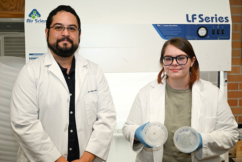 UAM Assistant Professor Arturo Quintero Ferrer (left) works with Macie Carter, a pre-medical biology and biochemistry major from East End. (Special to The Commercial/University of Arkansas at Monticello)