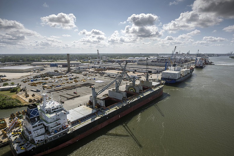 Three vessels work to load and unload cargo at the Georgia Ports Authority Ocean Terminal in June in Savannah, Ga.
(Courtesy of Georgia Port Authority/via AP/Stephen B. Morton)