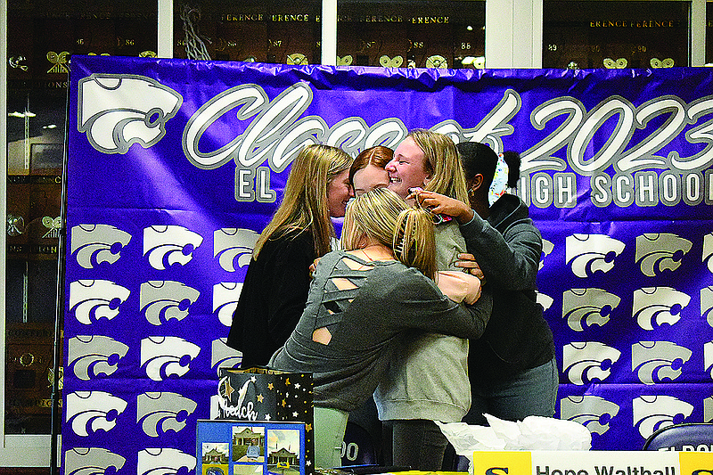 El Dorado golfer Hope Walthall receives congratulations after signing with Southeastern Oklahoma State University.