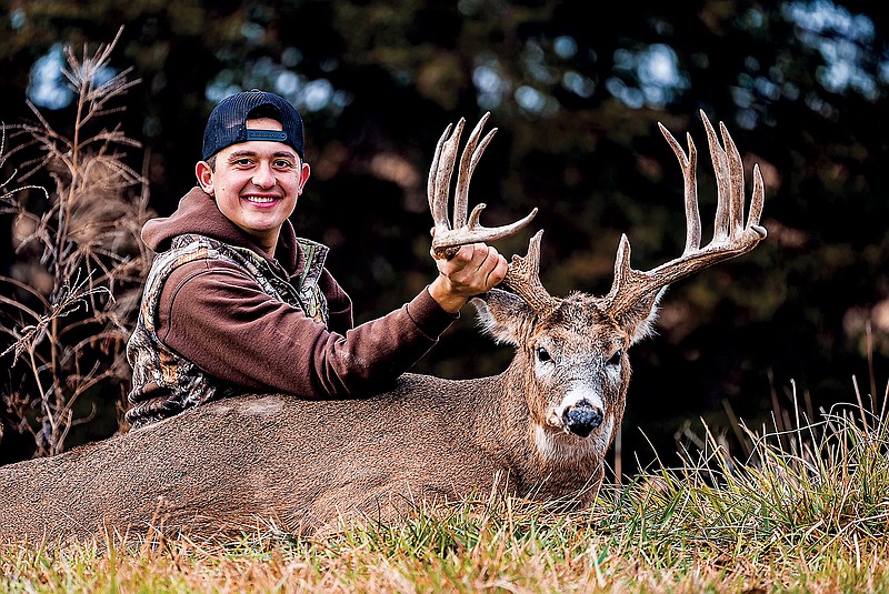 Max Mongrello poses with a giant Iowa buck. (Contributed photo)