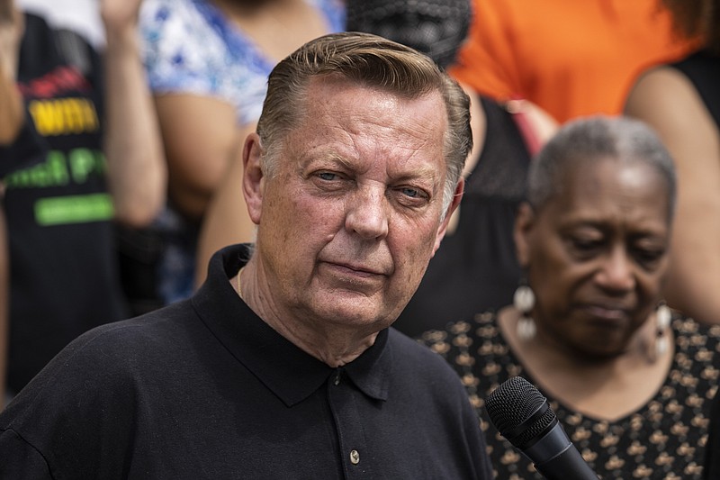 FILE - Father Michael Pfleger speaks during a news conference outside St. Sabina Church in Chicago, May 24, 2021. Pfleger has been reinstated as leader of his parish after being cleared by church officials of allegations that he sexually abused a minor decades ago. The Chicago Archdiocese released a letter Saturday, Dec. 10, 2022 saying that a review board found “no reason to suspect” that the Rev. Michael Pfleger was guilty of the allegations. (Ashlee Rezin Garcia/Chicago Sun-Times via AP, file)