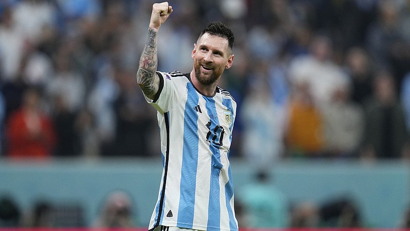 Argentina's Lionel Messi celebrates during the World Cup semifinal soccer match between Argentina and Croatia at the Lusail Stadium in Lusail, Qatar, Tuesday, Dec. 13, 2022. (AP Photo/Natacha Pisarenko)