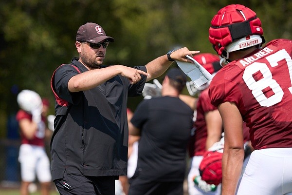 Morgan Turner is shown coaching at practice on the Football Practice Field on August 12, 2021, in Stanford, Calif.