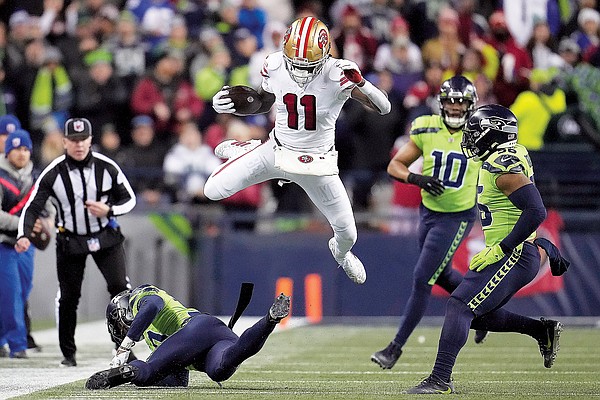 49ers topple Seahawks to clinch NFC West title