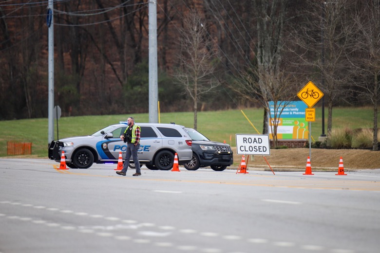 Staff photo by Olivia Ross  / Apison Pike is seen closed on Tuesday, December 20, 2022 following a train derailment in Collegedale.
