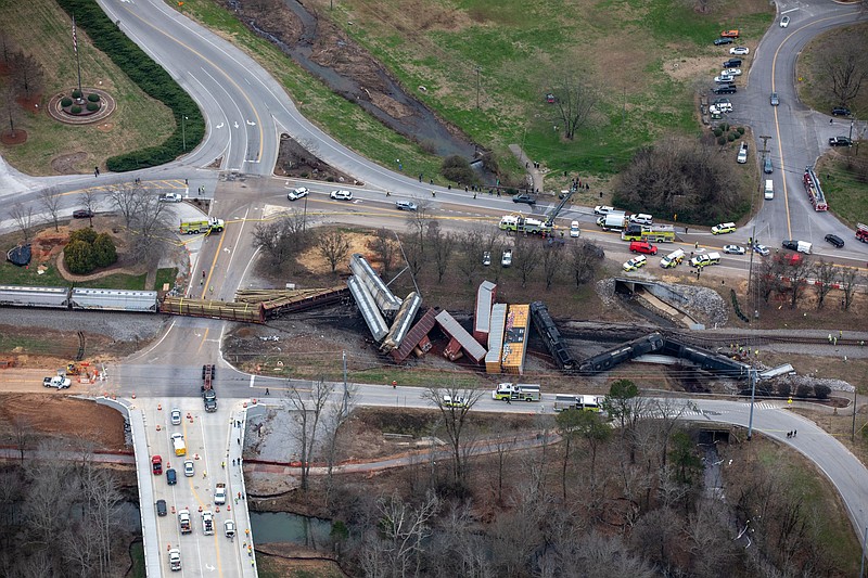 Photo by Todd Pettibone Aviation Specialists Inc. / Emergency vehicles respond to the scene of a Norfolk Southern Railway train derailment in Collegedale on December 20, 2022.