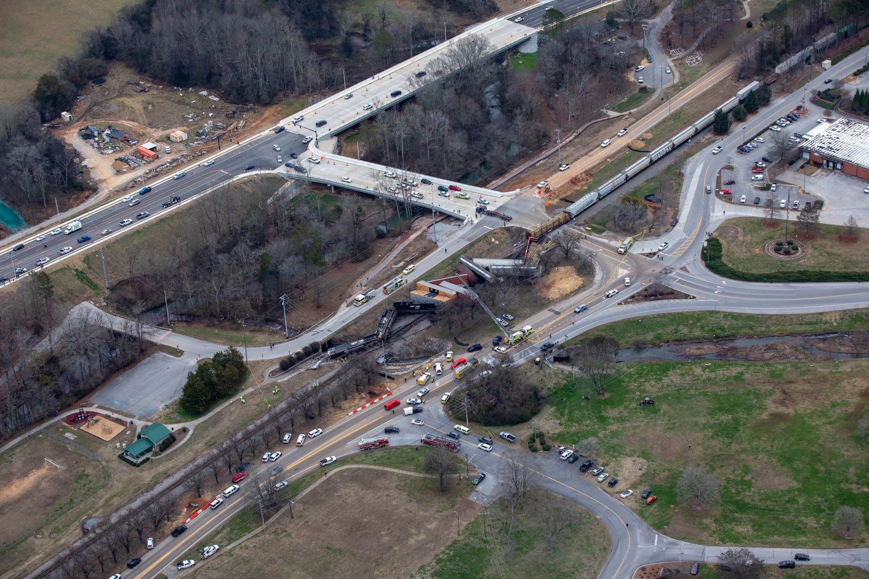 Photo by Todd Pettibone Aviation Specialists Inc. / Emergency vehicles respond to the scene of a Norfolk Southern Railway train derailment in Collegedale on December 20, 2022.