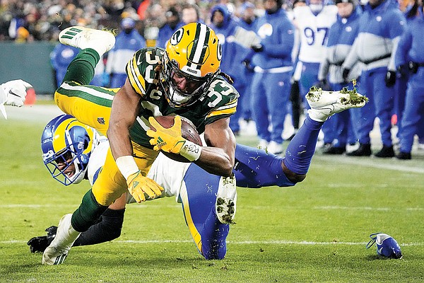 Packers: Dillon, Jones rush past Rams to keep playoff hopes alive