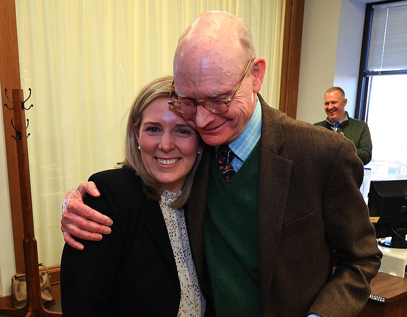 Executive Editor Eliza Hussman Gaines, left, hugs Walter E. Hussman, Jr., Tuesday in the Arkansas Democrat-Gazette newsroom in Little Rock after being named the next publisher of WEHCO Media Inc. effective Jan. 1. (Arkansas democrat-Gazette/Staton Breidenthal).