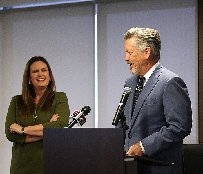 Gov.-elect Sarah Sanders (left) watches as Hugh McDonald speaks after Sanders announced she would nominate him to be Secretary of Commerce during a press conference on Thursday in Little Rock.
(Arkansas Democrat-Gazette/Thomas Metthe)