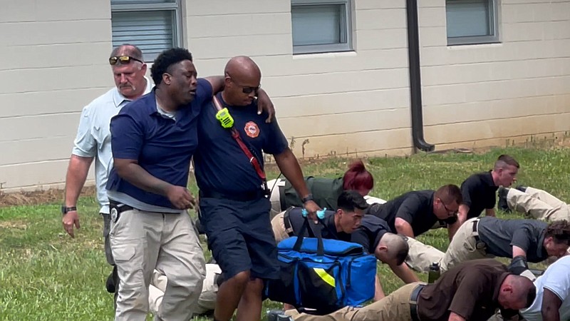 This still image taken from video released in an Arkansas State Police report shows Jonesboro officer Vincent Parks being attended to by medical personnel during a July 17 training at a state police academy. (Courtesy of Arkansas State Police)
