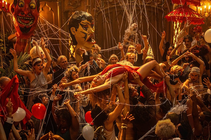 The wild party: Nellie LaRoy (Margot Robbie) crowd surfs her way to the top in Damian Chazelle’s overstuffed epic about jazz age Hollywood decadence “Babylon.”