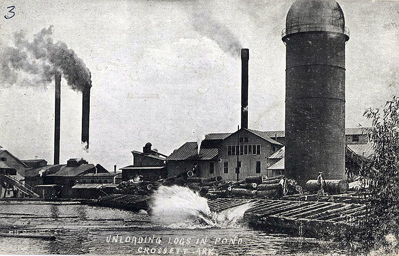 Logs are unloaded in a pond at a sawmill at Crossett Lumber Co.
(Courtesy of the Encyclopedia of Arkansas)
