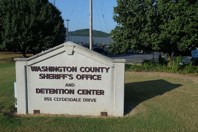 A sign for the Washington County sheriff's office and detention center, the county jail, is seen in Fayetteville in this Aug. 27, 2021 file photo. (NWA Democrat-Gazette/Andy Shupe)