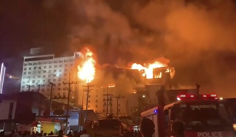 In this video still, fire engulfs part of the Grand Diamond City casino and hotel Thursday in Poipet, Cambodia.
(AP/Fresh News)