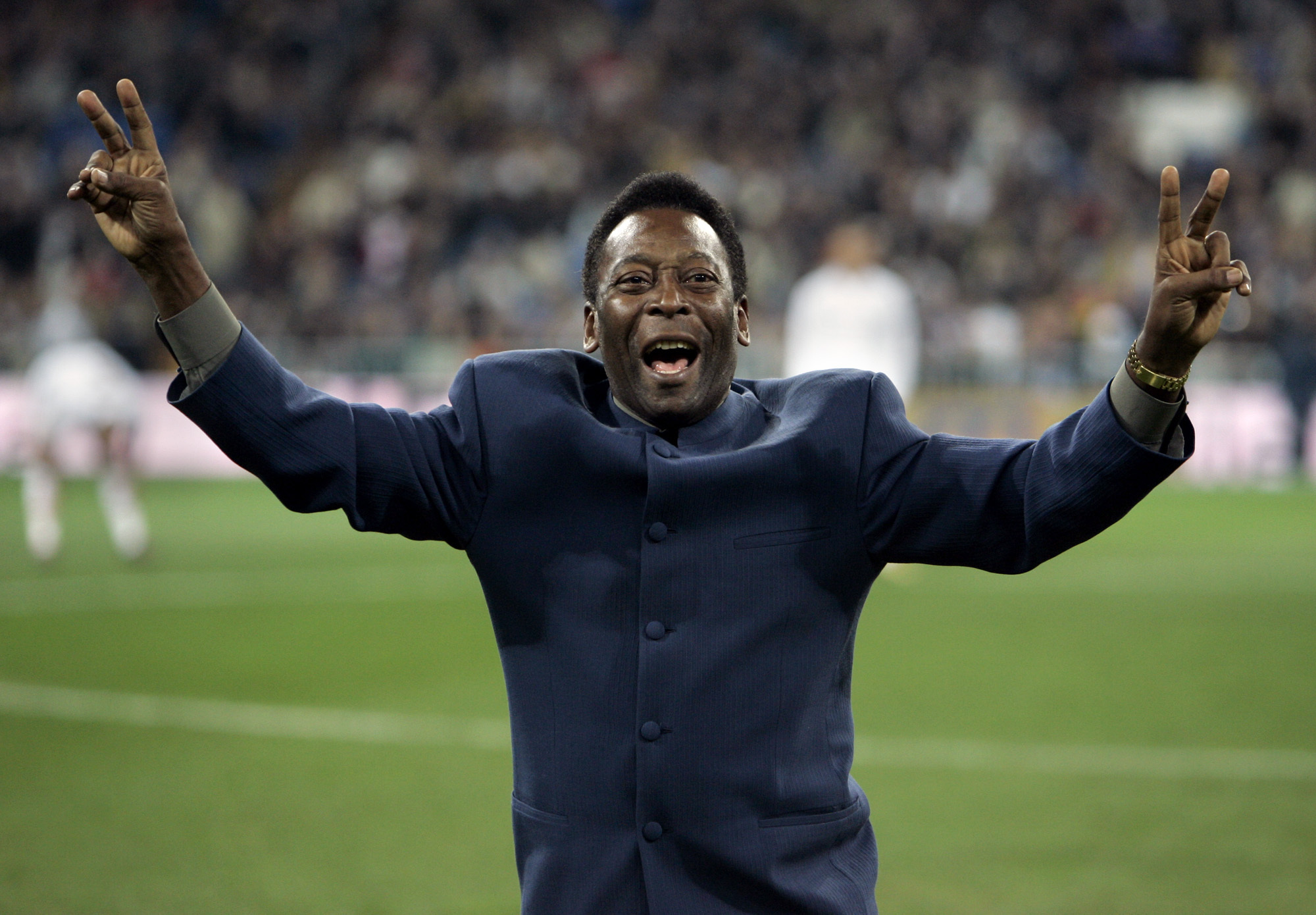 AP photo by Jasper Juinen / Brazilian soccer legend Pelé greets the crowd ahead of a Spanish league match on Jan. 16, 2005, in Madrid. Pelé, who won a record three World Cups and became one of the most commanding sports figures of the past century, died Thursday in Sao Paulo at age 82.