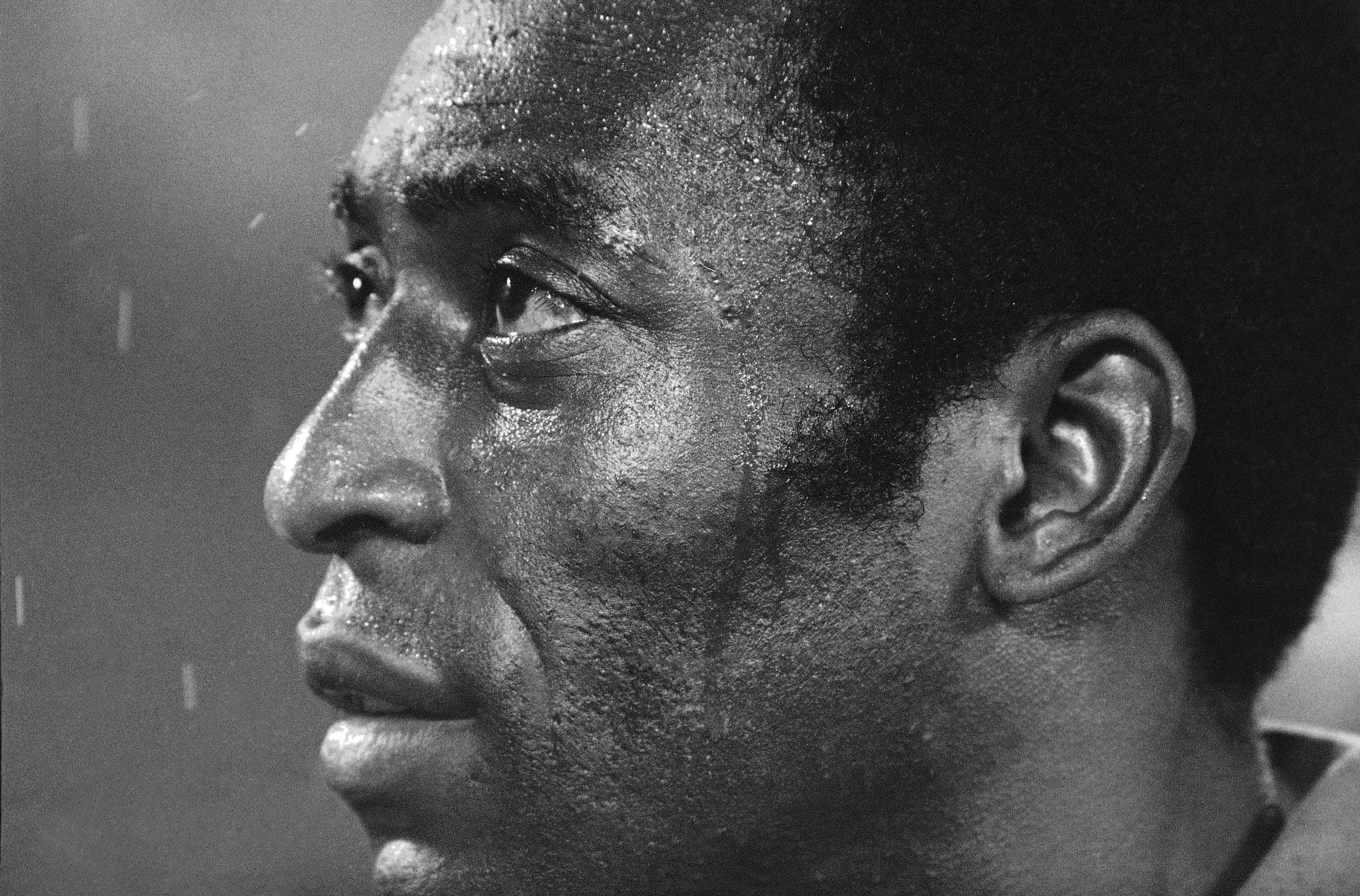 AP photo by Ray Stubblebine / Pelé listens to "The Star-Spangled Banner" prior to a North American Soccer League playoff game between his New York Cosmos and the visiting Rochester Lancers on Aug. 24, 1977, in East Rutherford, New Jersey. Pelé, the Brazilian king of soccer who won a record three World Cups and became one of the most commanding sports figures of the past century, died Thursday in Sao Paulo at age 82.