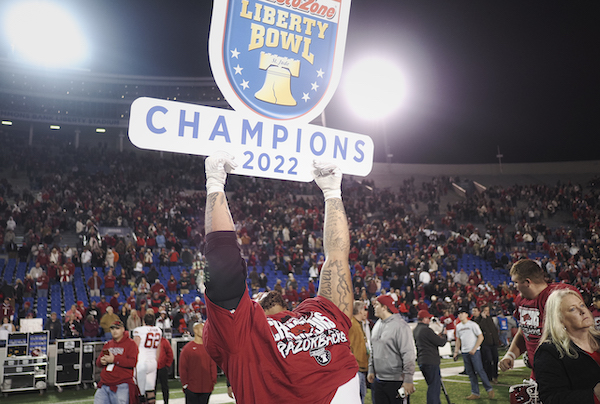 WholeHogSports - Wacky in Memphis: Hogs hold on, win Liberty Bowl in 3 OTs - Vimarsana News