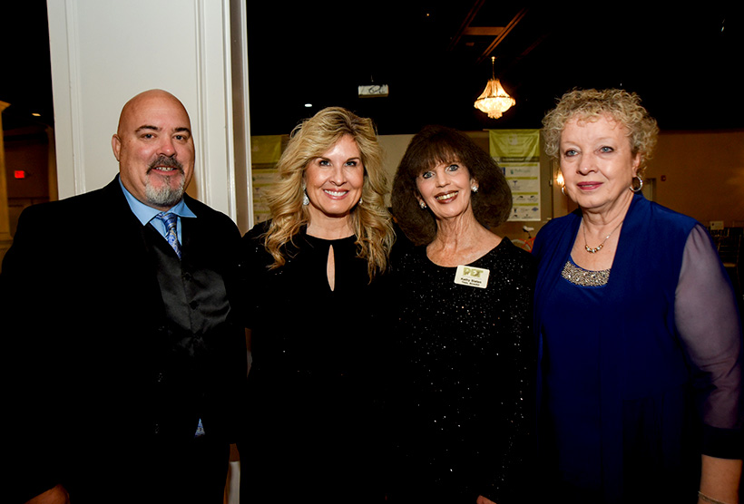 Tony and Becky Mayo, Kathy Slaten, PPC board member, Anita Kupcho, PPC board member, from left, attend Pet Placement Center's Tails at Twilight fundraiser on Thursday, Nov. 10, 2022 at Restoration Southside. / Photo by Angela Foster