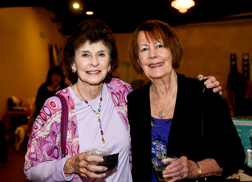 Pam Joyner, left, and Terry Perruso attend Pet Placement Center's Tails at Twilight fundraiser on Thursday, Nov. 10, 2022 at Restoration Southside. / Photo by Angela Foster