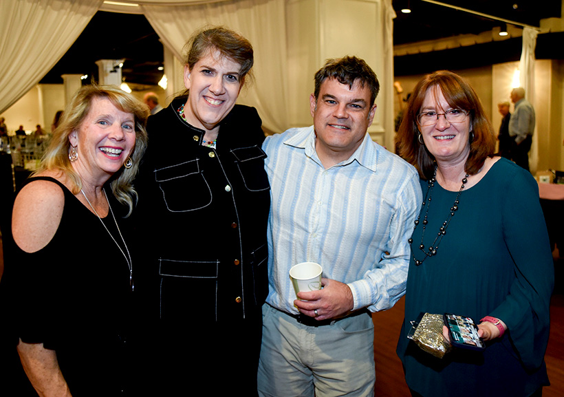 Kathy Fortin, Robyn Reesman Duff, Iain Duff and Laura Glassell, from left, attend Pet Placement Center's Tails at Twilight fundraiser on Thursday, Nov. 10, 2022 at Restoration Southside. / Photo by Angela Foster