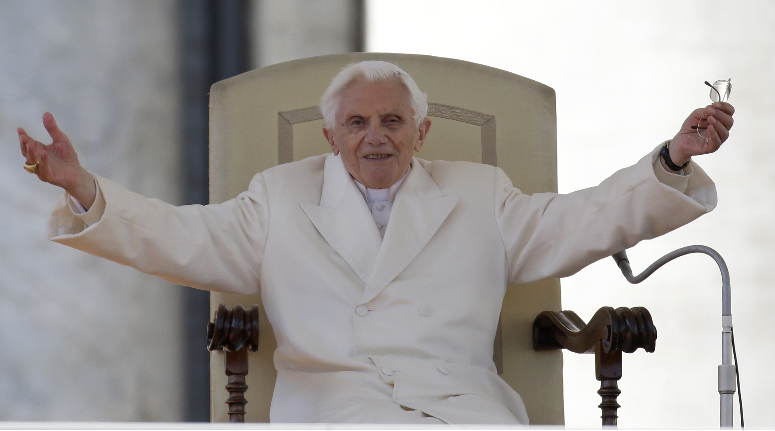 FILE - Pope Benedict XVI opens his arms during his final general audience in St. Peter's Square at the Vatican, on Feb. 27, 2013, before retiring. He was the reluctant pope, a shy bookworm who preferred solitary walks in the Alps and Mozart piano concertos to the public glare and majesty of Vatican pageantry. When Cardinal Joseph Ratzinger became Pope Benedict XVI and was thrust into the footsteps of his beloved and charismatic predecessor, he said he felt a guillotine had come down on him. The Vatican announced Saturday Dec. 31, 2022 that Benedict, the former Joseph Ratzinger, had died at age 95. (AP Photo/Gregorio Borgia, File)