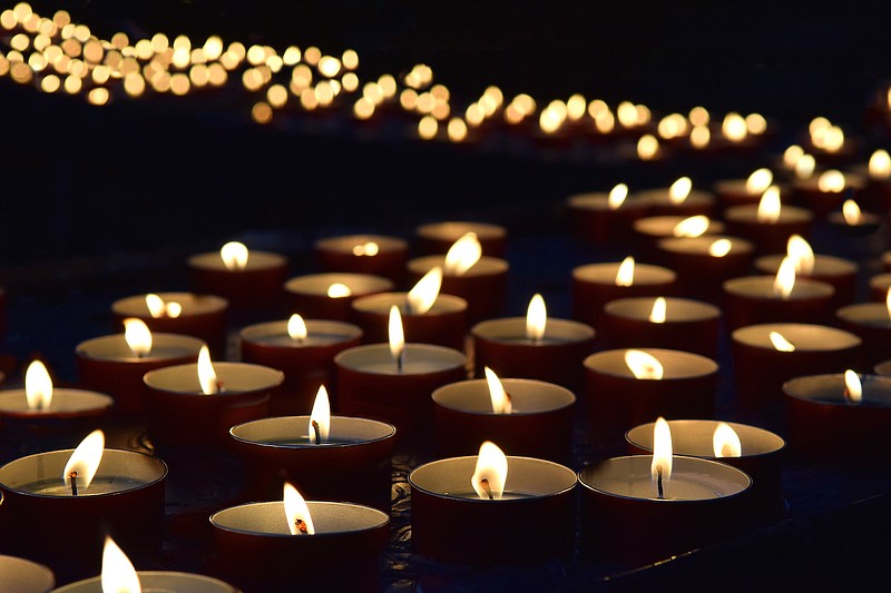 Memorial candles / Getty Images
