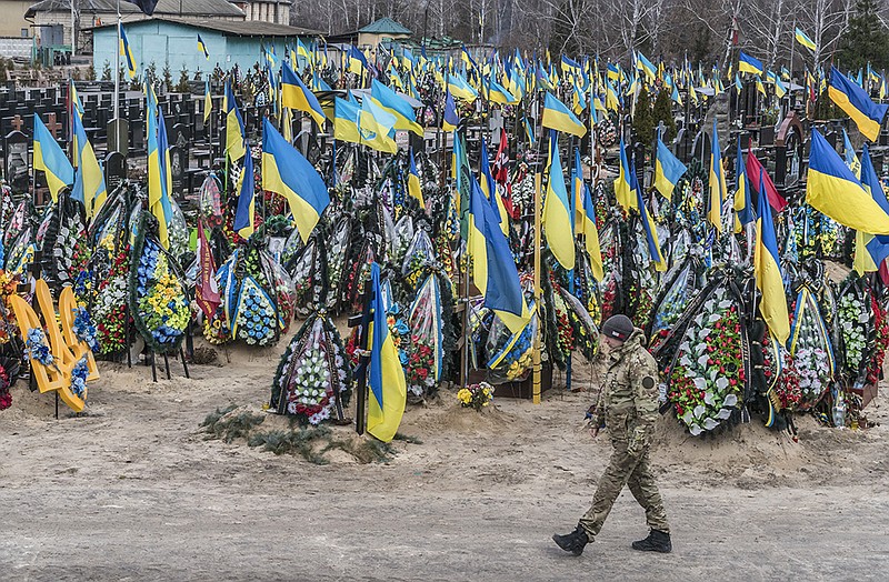 Ukrainian flags fly Wednesday at a section of graves for soldiers killed since Russia’s invasion at Lisove Cemetery in Kyiv.
(The New York Times/Brendan Hoffman)