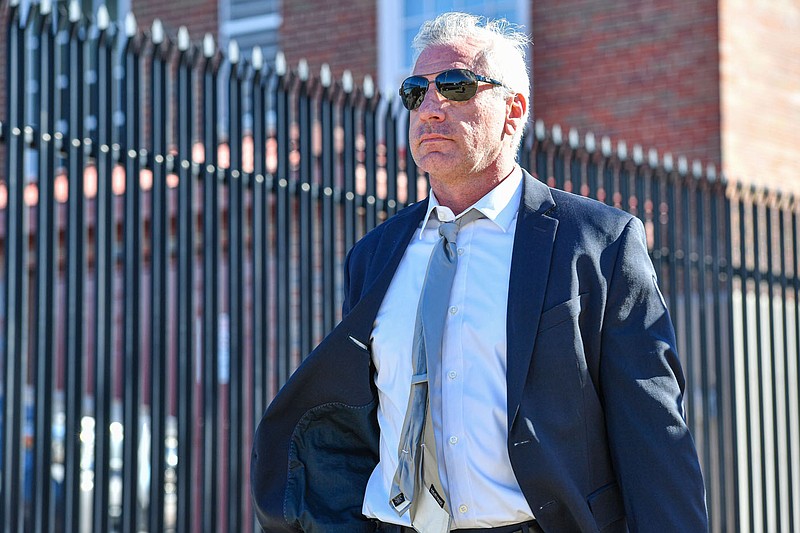 Robert Cessario, a former FBI agent who pleaded guilty to destroying evidence in a public corruption case in 2022, walks to his car, Thursday, Jan. 5, 2023, following his sentencing hearing at the Judge Isaac C. Parker Federal Building and Courthouse in downtown Fort Smith. 
(NWA Democrat-Gazette/Hank Layton)