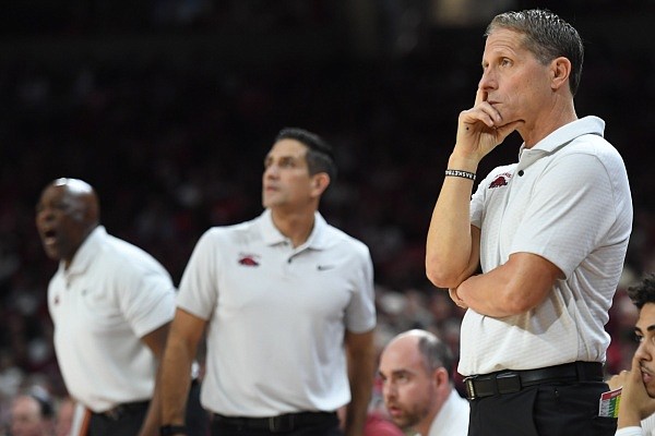 Arkansas coach Eric Musselman (right) watches Wednesday, Jan. 4, 2023, during the first half of play against Missouri in Bud Walton Arena in Fayetteville. Visit nwaonline.com/photo for the photo gallery.