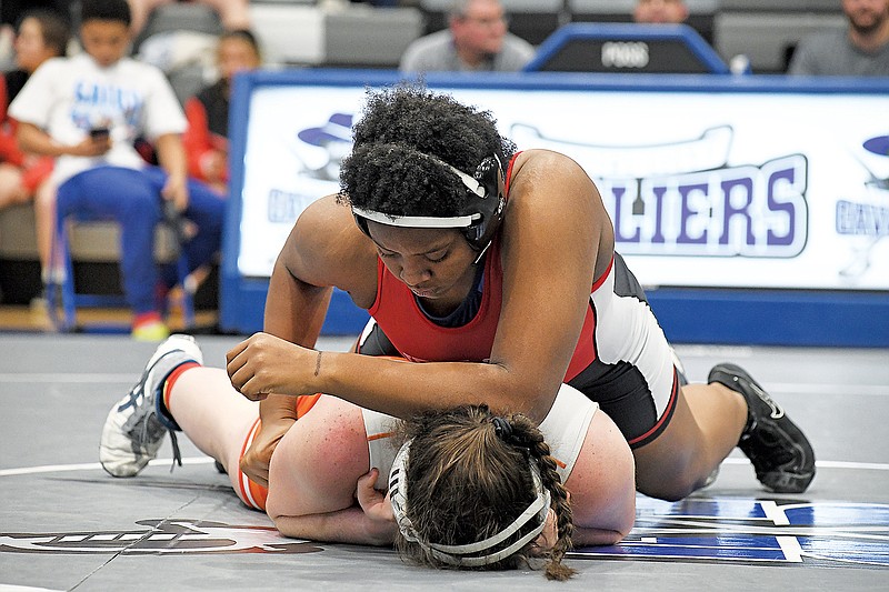 Kyla Finney of Jefferson City holds Owensville’s Kelby Schoenfeld to the mat during a 190-pound match Friday in the Capital City Girls Invitational at Capital City High School. (Eileen Wisniowicz/News Tribune)