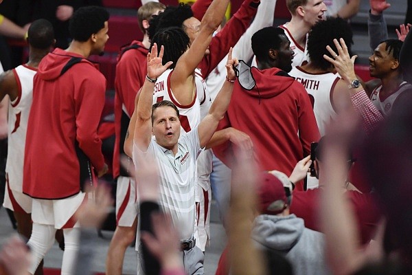 Arkansas coach Eric Musselman calls the hogs with his team after beating Alabama 81-66 during the second half of an NCAA college basketball game in Fayetteville, Ark. Wednesday, Feb. 24, 2021. (AP Photo/Michael Woods) Arkansas coach Eric Musselman calls the hogs with his team after beating Alabama 81-66 during the second half of an NCAA college basketball game in Fayetteville, Ark. Wednesday, Feb. 24, 2021. (AP Photo/Michael Woods)