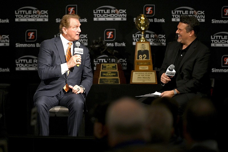 Super Bowl champion quarterback Joe Theismann (left) discussed many topics with host David Bazzel during the Little Rock Touchdown Club annual awards banquet Friday at the DoubleTree hotel in downtown Little Rock.
(Arkansas Democrat-Gazette/Stephen Swofford)