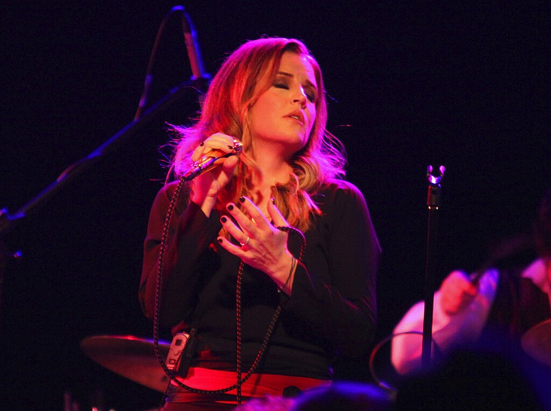 FILE - Lisa Marie Presley performs during her Storm & Grace tour on June 20, 2012, at the Bottom Lounge in Chicago. (Photo by Barry Brecheisen/Invision/AP, File)