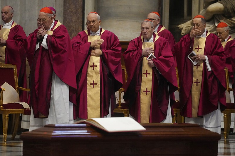 Cardinals and bishops pray during the funeral ceremony of Australian Cardinal George Pell in St. Peter's Basilica at the Vatican, Saturday Jan. 14, 2023. (AP/Gregorio Borgia)